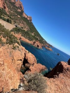 Vibrant coastal cliffs overlooking the blue Mediterranean Sea in Cape Town.