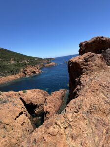 Stunning coastal cliffs and blue ocean view from a rocky vantage point.