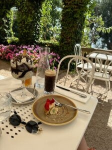 Sweet dessert with strawberries and cream on a rustic plate.