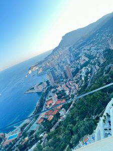 Breathtaking view of Monaco city skyline overlooking the Mediterranean Sea from a high vantage point.