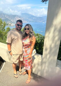 Breathtaking seaside view with couple enjoying vacation scenery at Villa Ephrussi de Rothschild in Saint Jean Cap Farrat